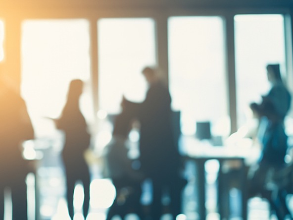 blurred people in office